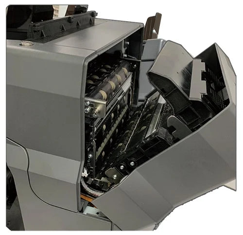 Close-up of a gray electronic device with open cover showing internal components.