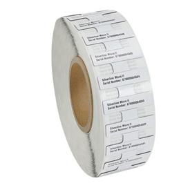 Roll of labels with printed text on a white background