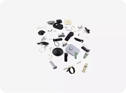Collection of small electronic components and accessories on a white background