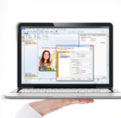 A laptop displaying a software interface, presumably the CardExchange Software.