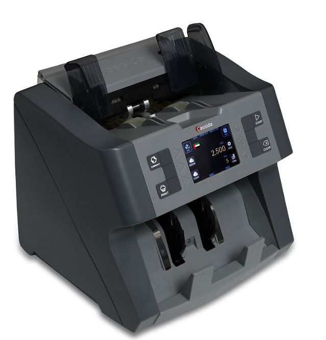 A Cassida Xpecto Multi-currency Mix Value Counter, a machine used for counting banknotes, with a digital display and two note slots on the front.