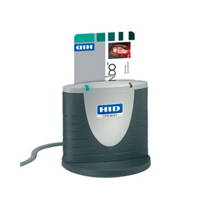 A black OMNIKEY 3121 smart card reader with a gray top, branded by HID.