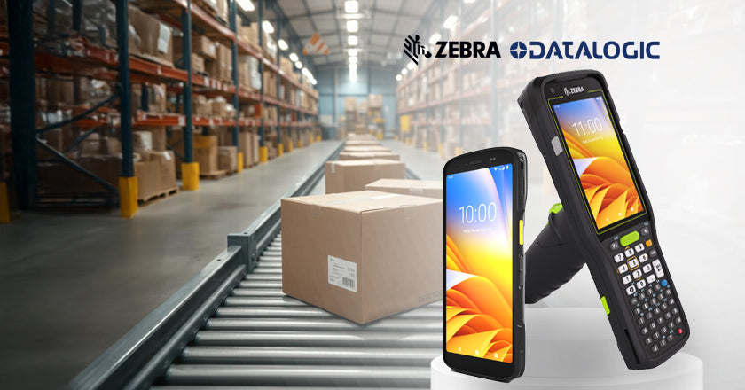 Two handheld devices with Zebra Datalogic branding in a warehouse setting.