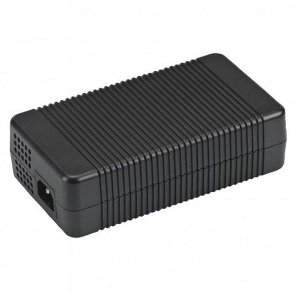 Black rectangular electronic device with ribbed surface on a white background