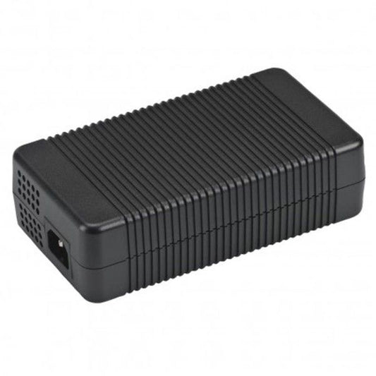 Black rectangular electronic device with ribbed surface on a white background