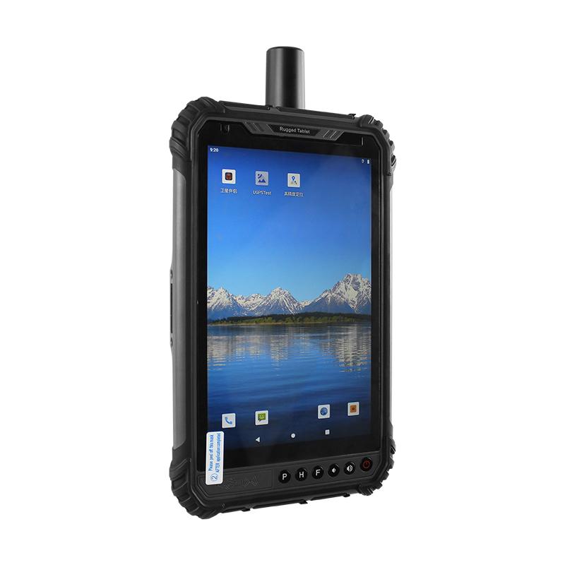 A rugged black tablet device with a top-mounted antenna, shown from a three-quarters angle against a plain white background. The screen displays a mountain lake wallpaper.