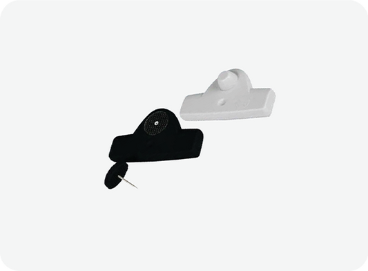 Black and white wall-mounted hooks on a white background