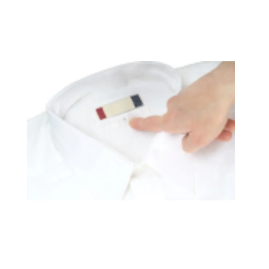 White shirt with a hand pointing to a label on a white background