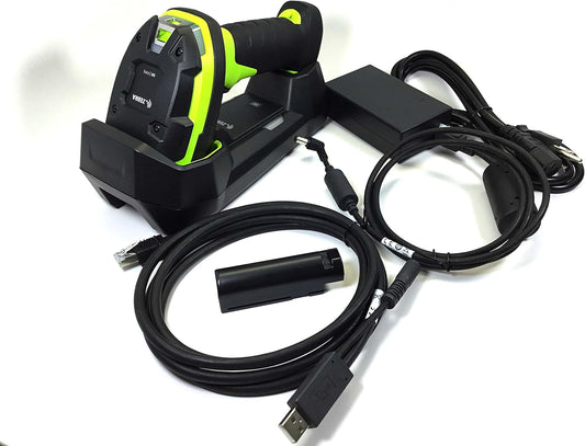 A cordless Zebra 1D barcode scanner with a green and black color scheme, accompanied by a charging cradle, power supply, and USB cord.