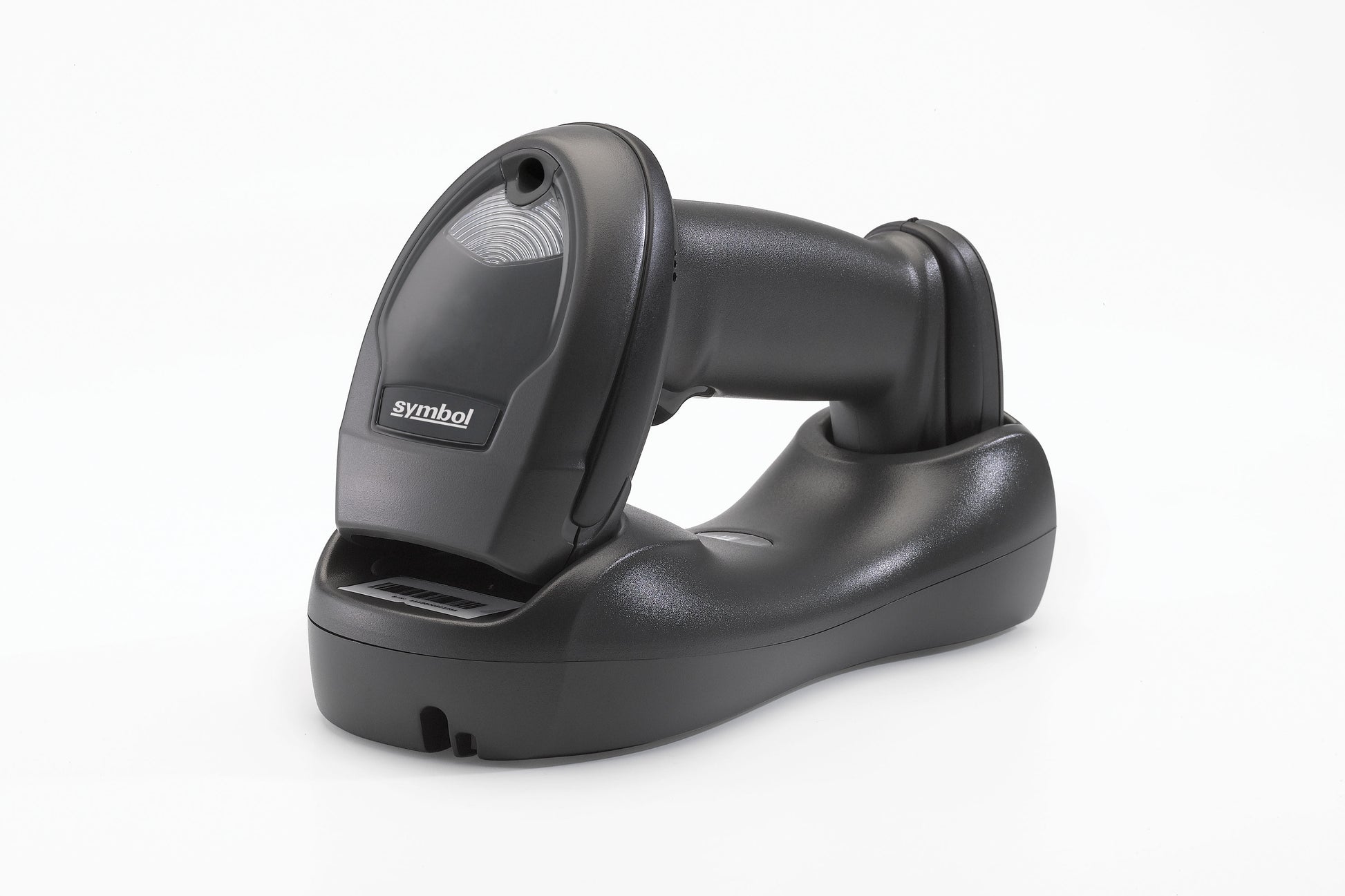 A black cordless linear imager barcode scanner with Bluetooth connectivity, resting on its charging cradle.