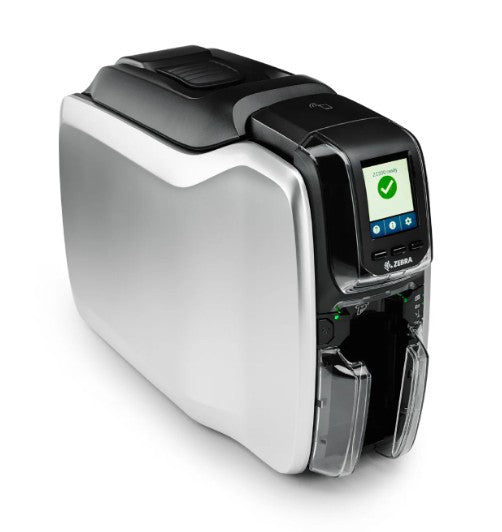 A Zebra mobile terminal printer with a brushed silver metallic body, black top housing, and a small color display screen showing a green checkmark, set against a plain white background.
