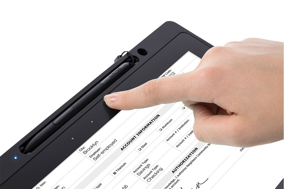 Hand using a stylus on a digital device with a white background