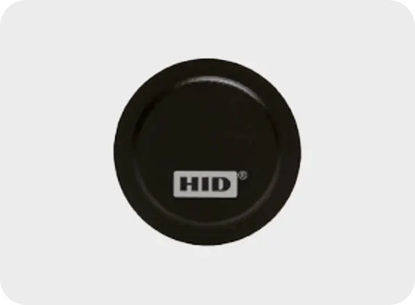 Black circular object with 'HID' logo on a white background
